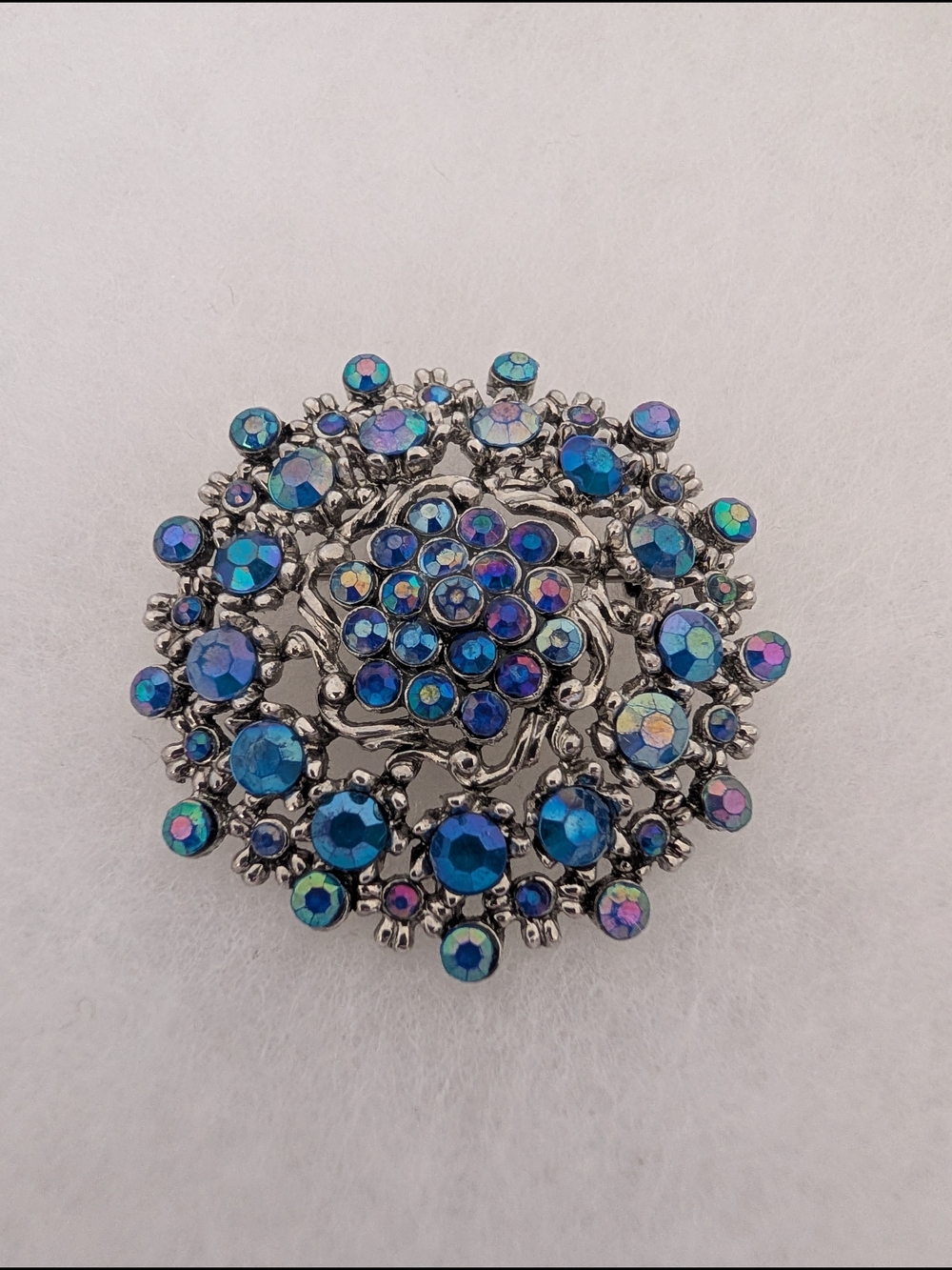 Vintage Blue Aurora Borealis Rhinestone Sunburst Brooch - MCM Iridescent